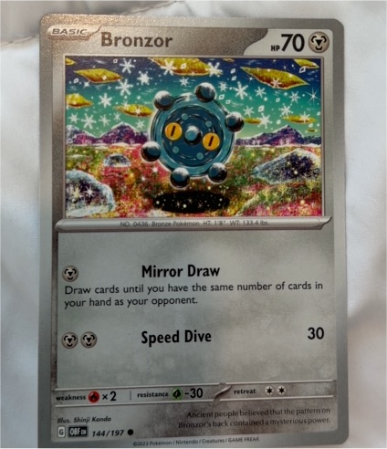 2023 Pokémon SV03: Obsidian Flames #144 Bronzor — front