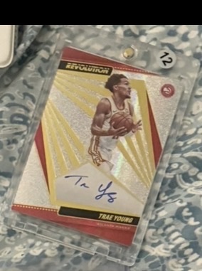 2021-22 Panini Revolution #AG-TYG Trae Young — front