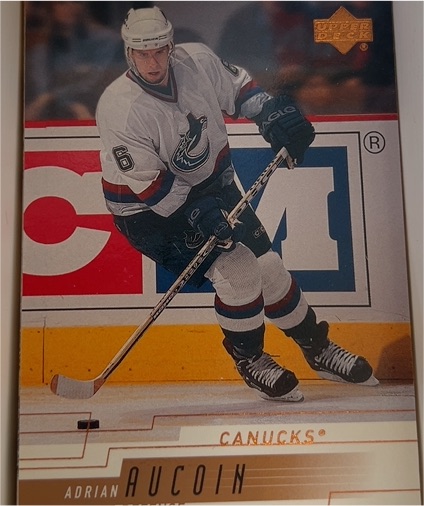 2000-01 Upper Deck #398 Adrian Aucoin Vancouver Canucks — front