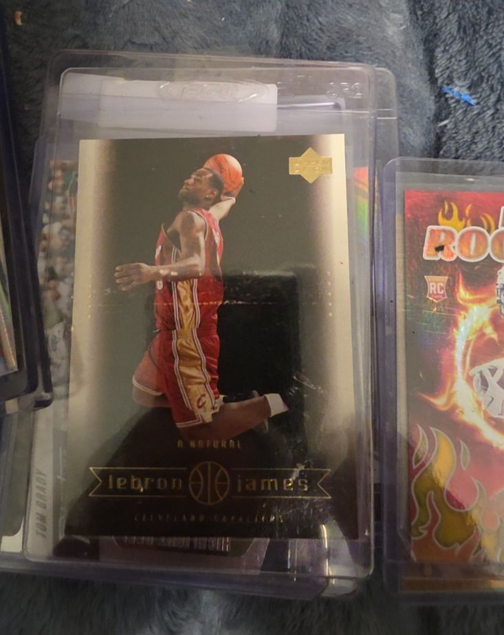 2003 Upper Deck Rookie Exclusives #RE-LJ LeBron James — front