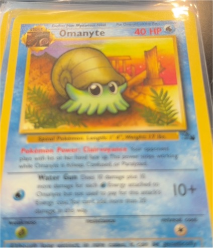 1999 Pokémon Fossil #52 Omanyte — front