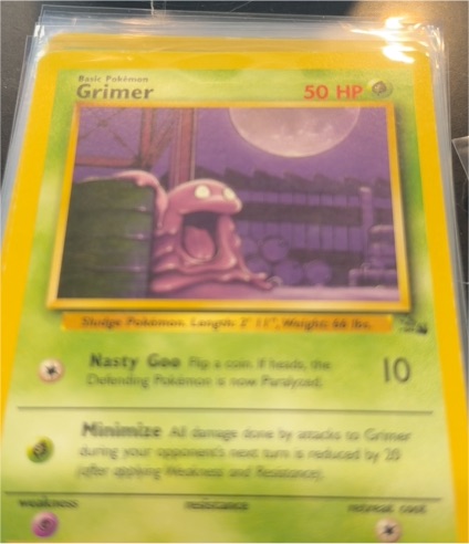 1999 Pokémon Fossil #48 Grimer — front