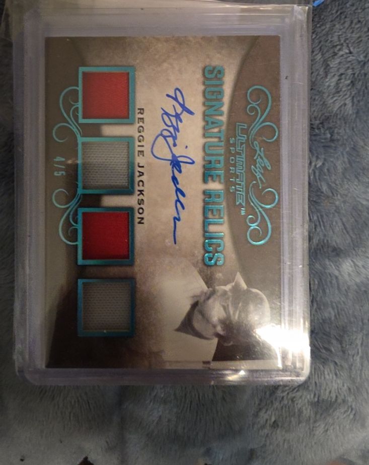 2007 Topps Sterling #4CSA-35 Reggie Jackson Signature Relics Quad Autograph — front
