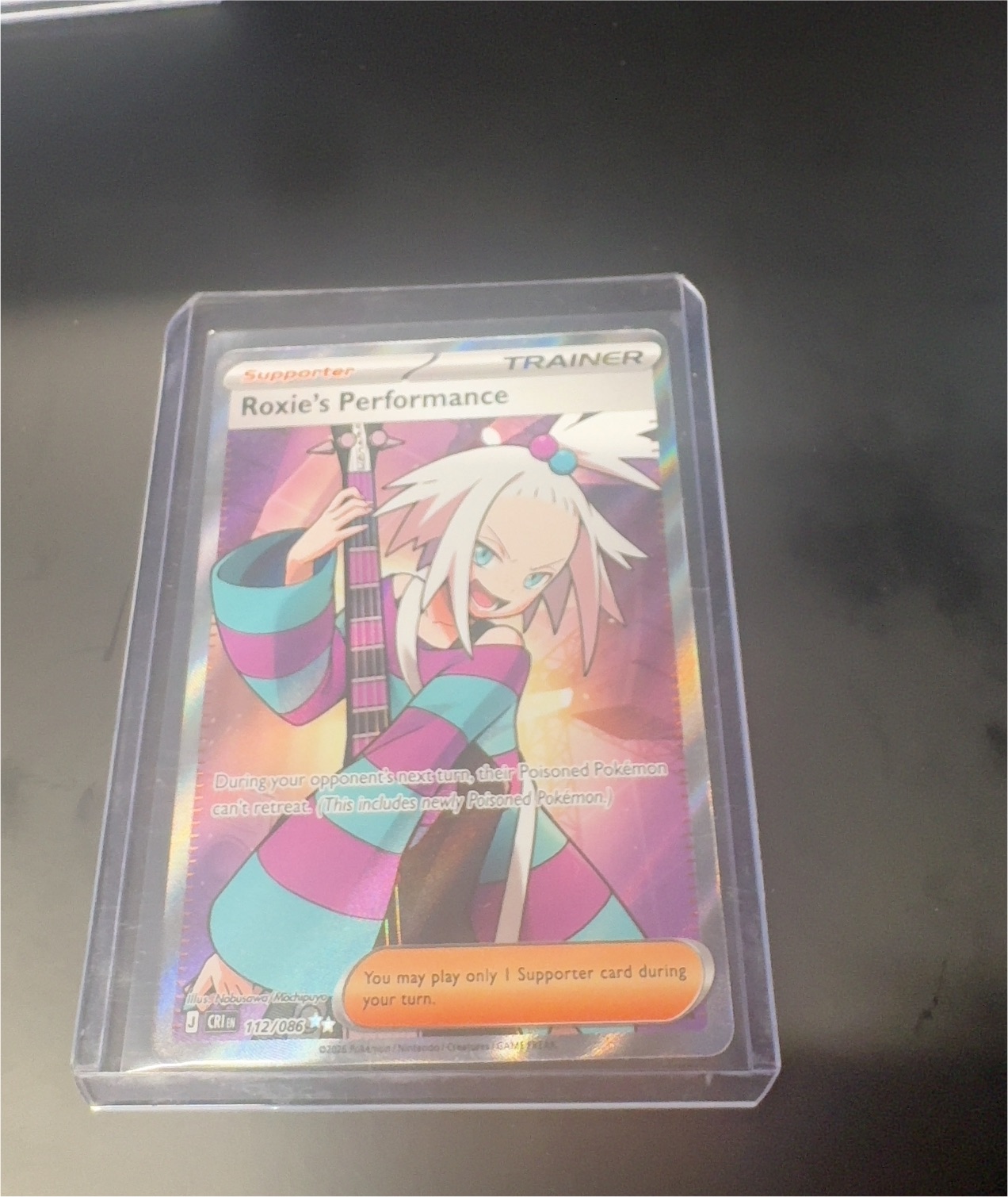 2025 Pokémon Black Bolt #112 Roxie's Performance — front