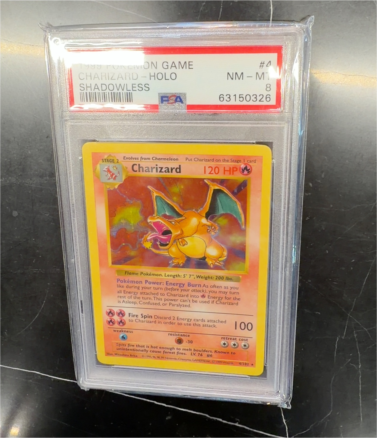 1999 Pokémon Base Set #4 Charizard — front