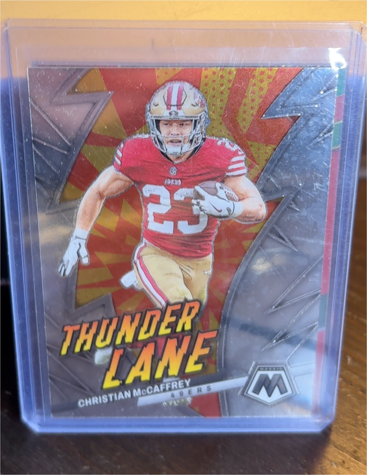 2023 Panini Mosaic Thunder Lane #TL-7 Christian McCaffrey — front