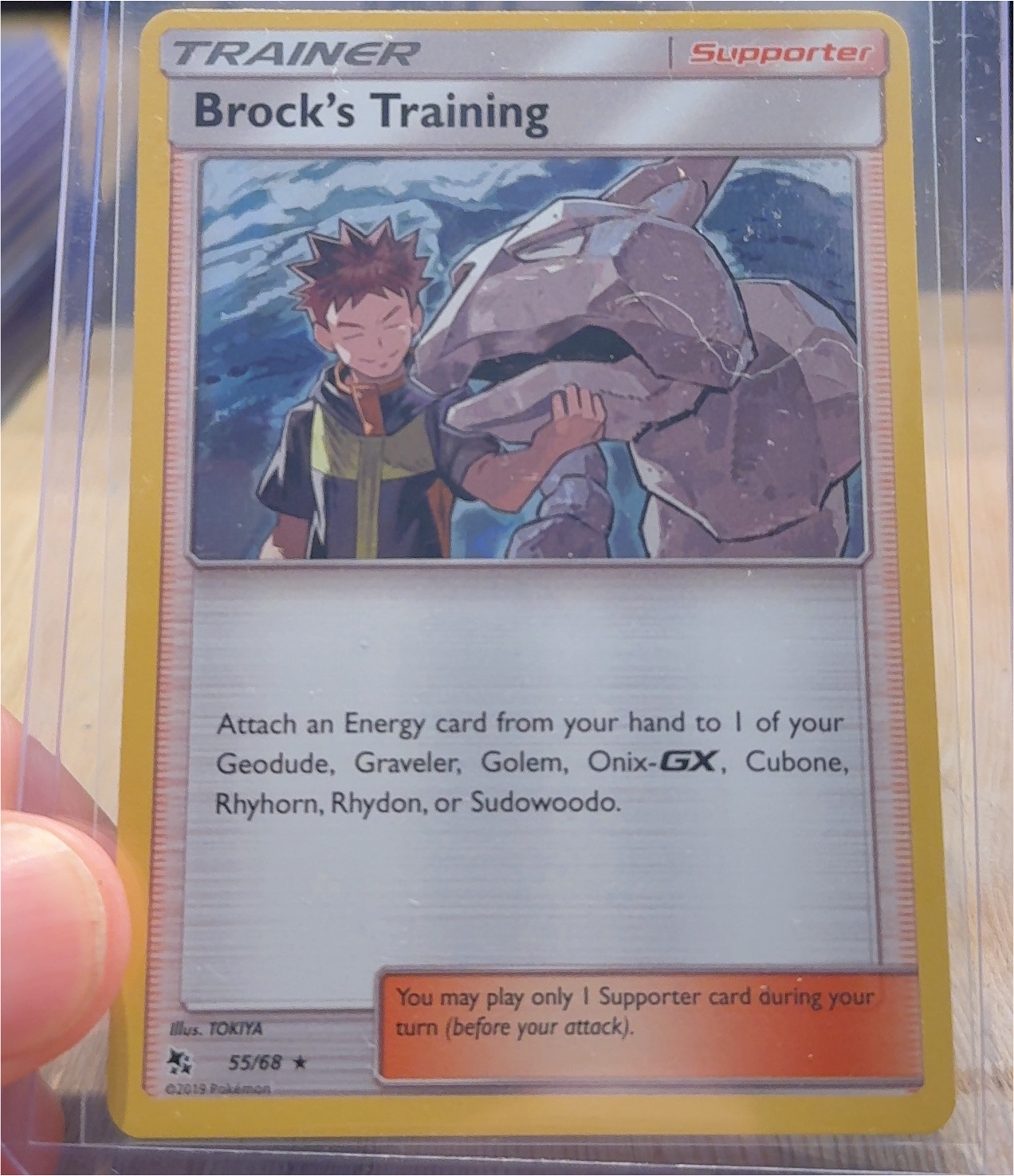 2019 Pokémon Hidden Fates #55 Brock's Training — front