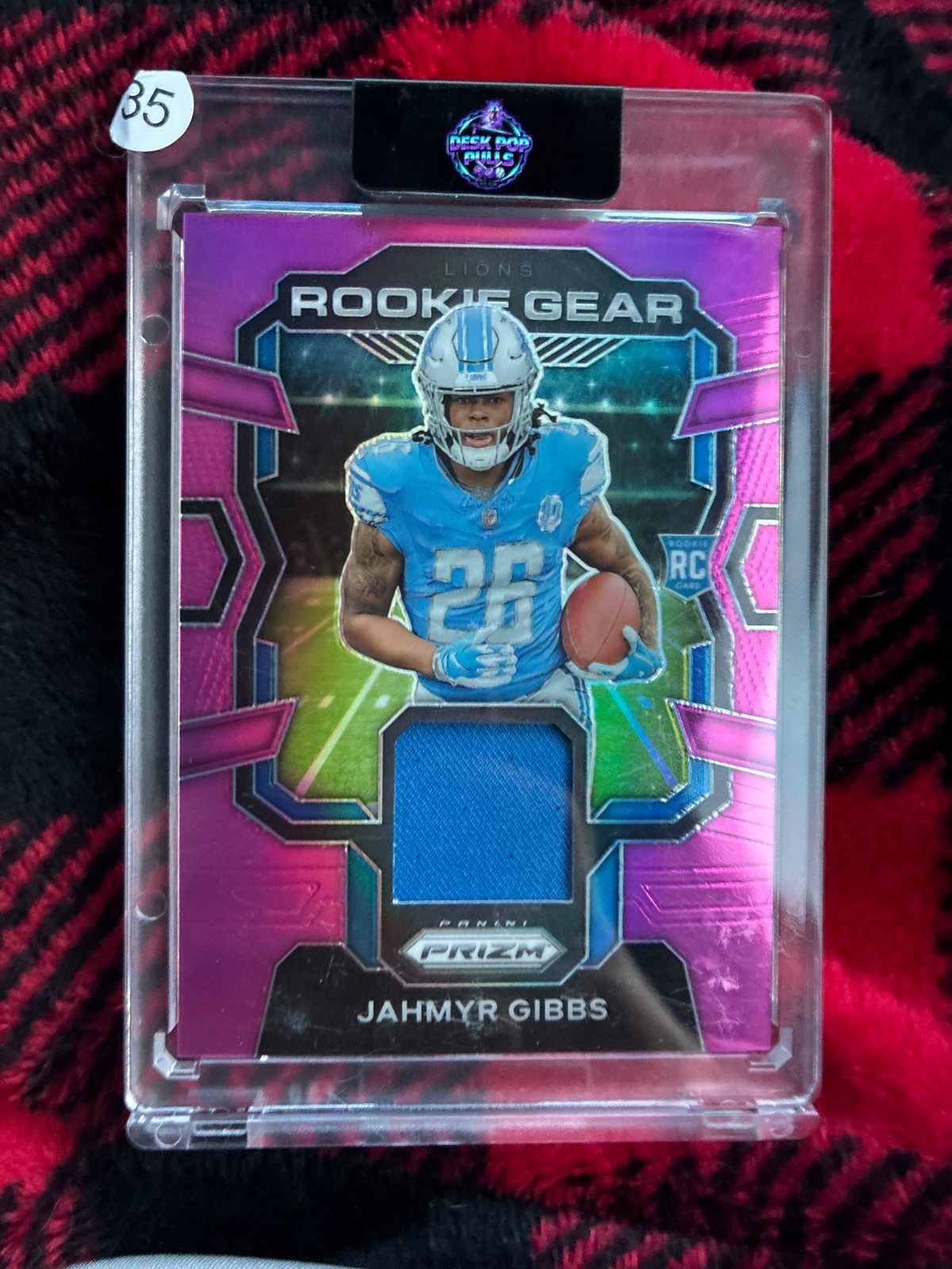 2023 Panini Prizm Rookie Gear Purple #RG-JG Jahmyr Gibbs — front