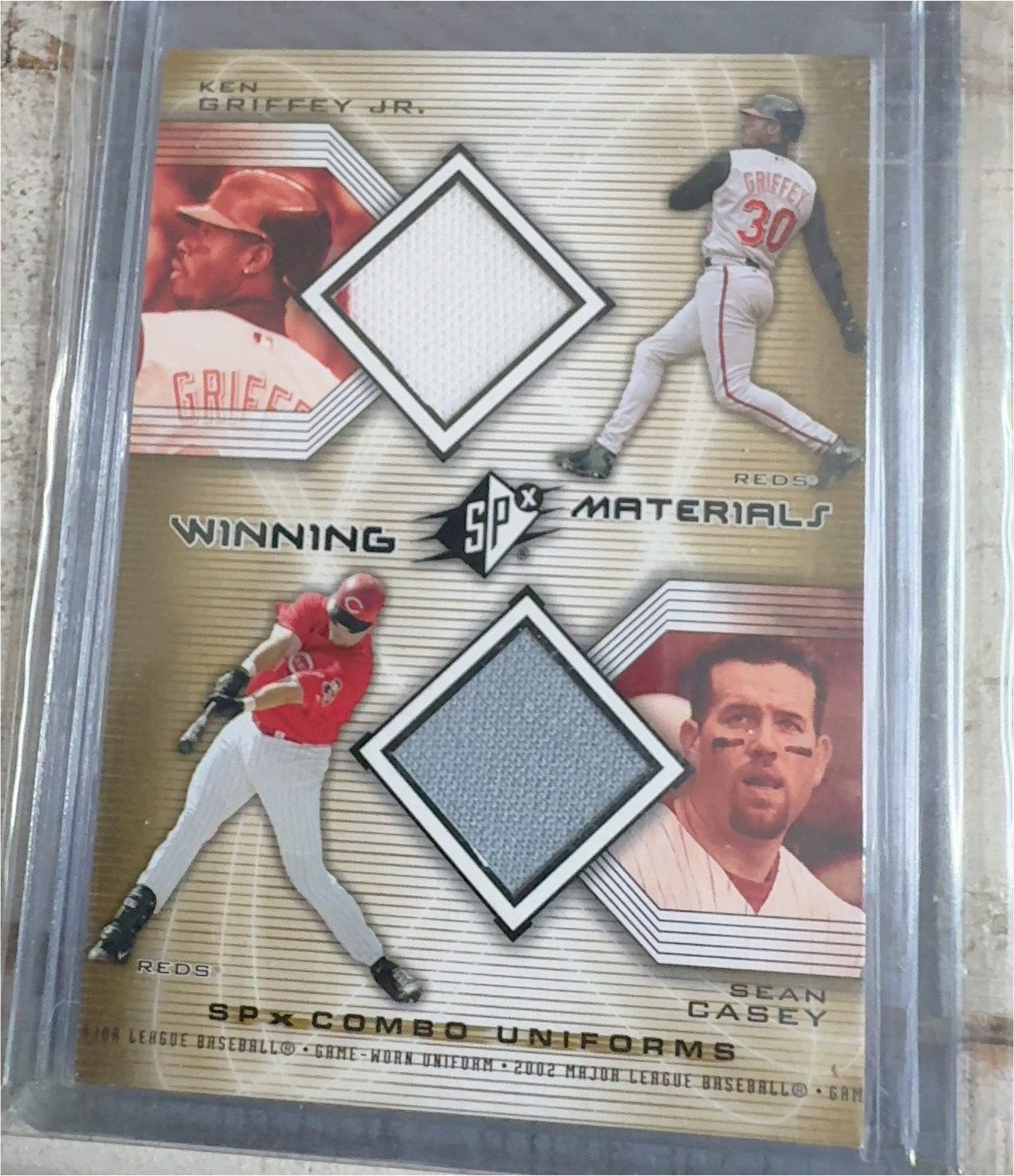 2002 Upper Deck SPx Winning Materials Combo Uniforms Ken Griffey Jr. and Sean Casey — front