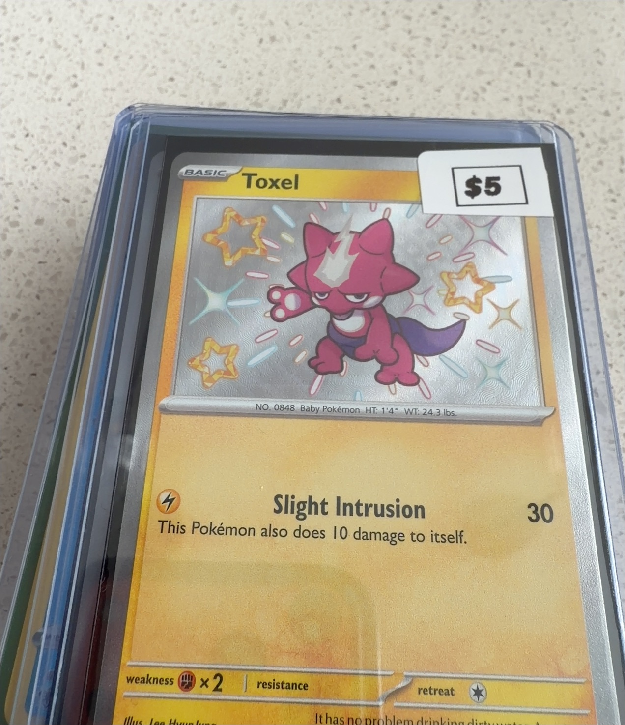2023 Pokémon TCG Scarlet & Violet Paldean Fates #140 Toxel — front