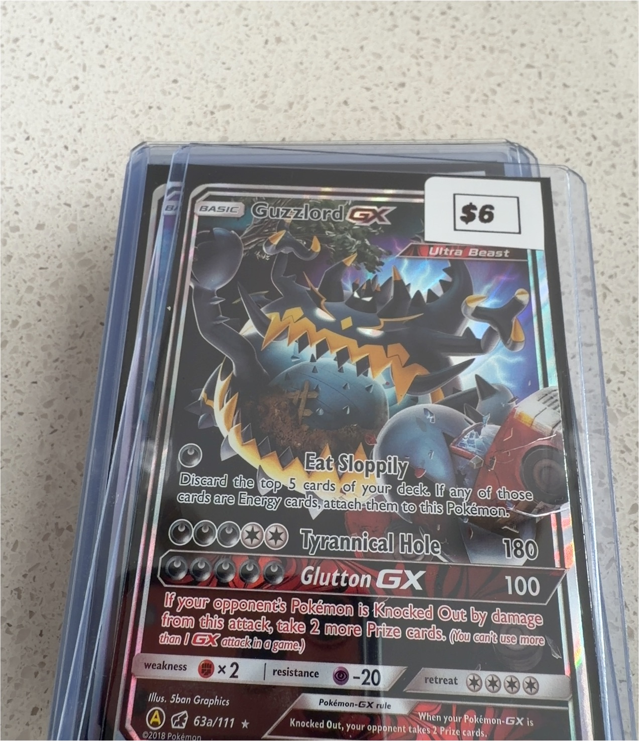 2018 Pokémon Crimson Invasion #63a Guzzlord GX — front