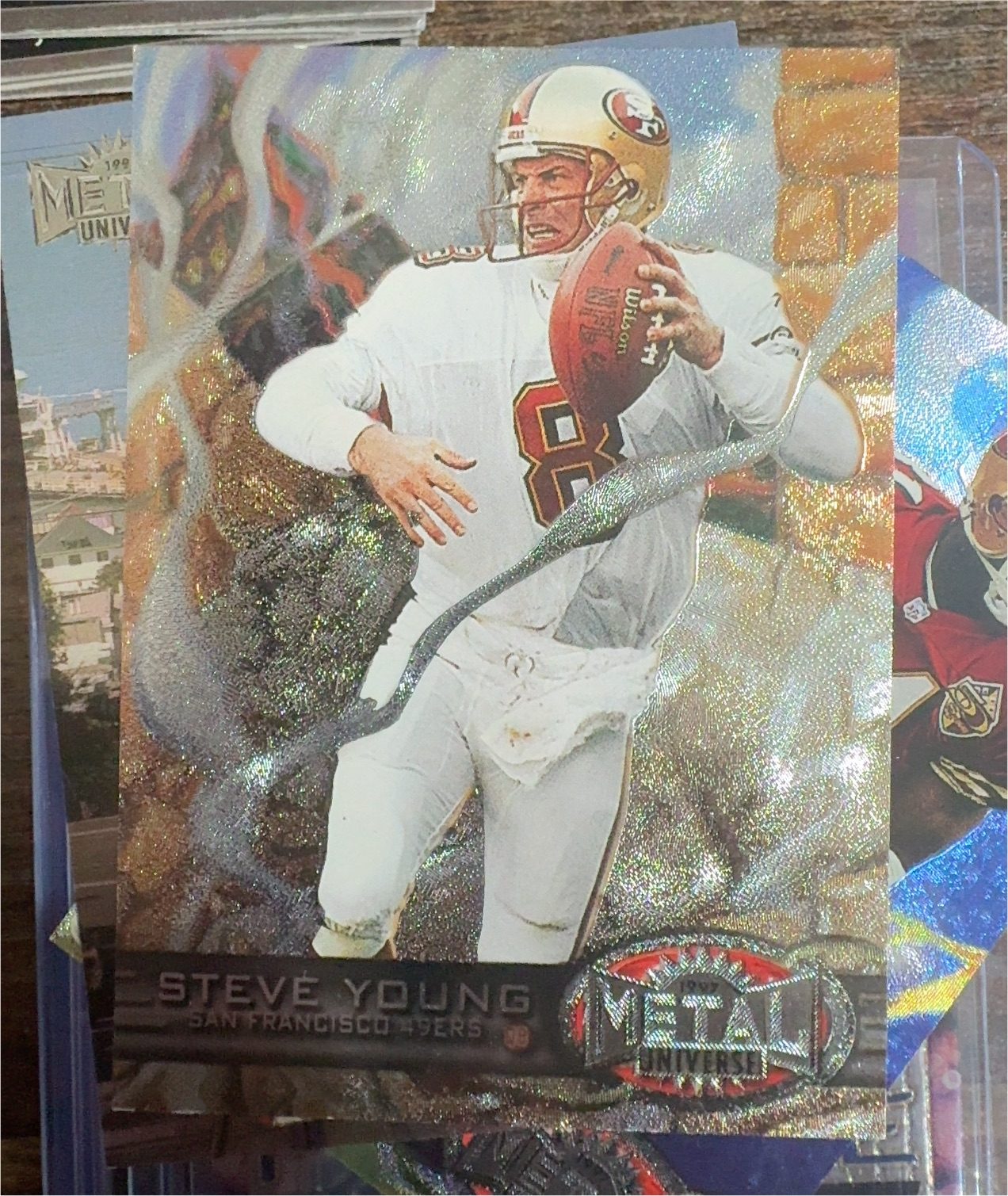 1997 Skybox Metal Universe #27 Steve Young — front