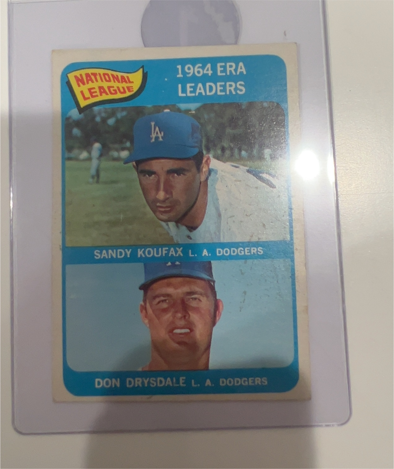 1965 Topps #8 NL ERA Leaders: Koufax, Drysdale — front