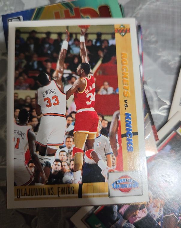1991 Upper Deck #33 Olajuwon vs. Ewing — front